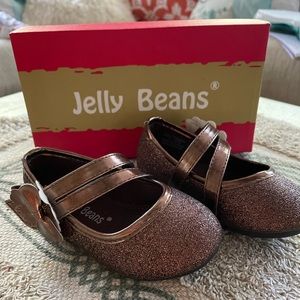Toddler’s Brand New Jelly Beans “Bronze” in color. Absolutely a beautiful